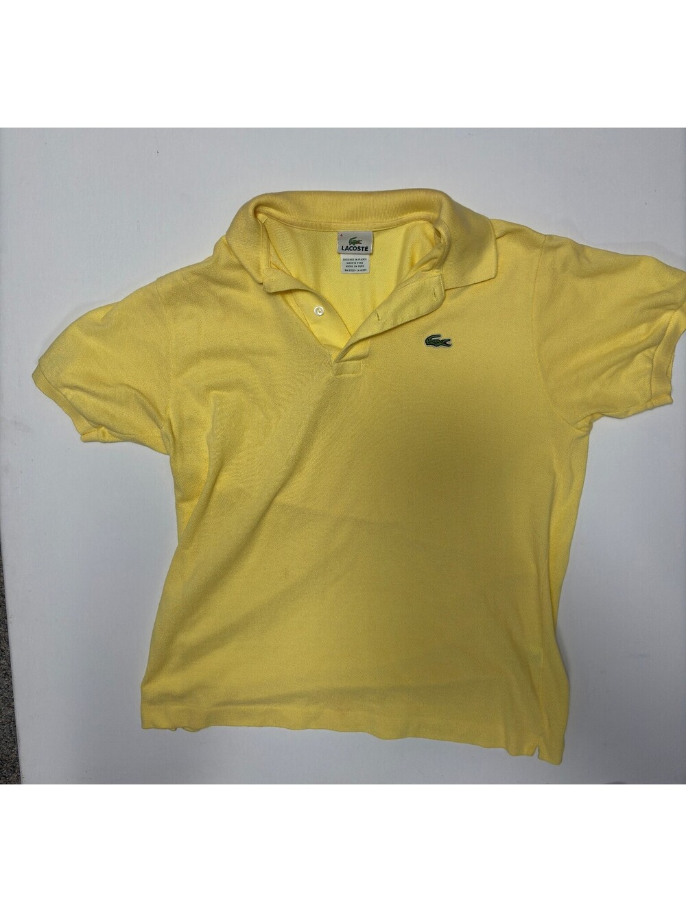 Lacoste yellow polo shirt